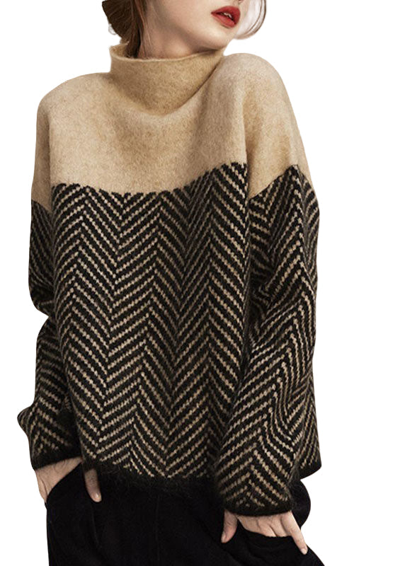 Dam pullover med hög krage, lös passform, perfekt för vinterdagar. Trendig och varm damtröja.
