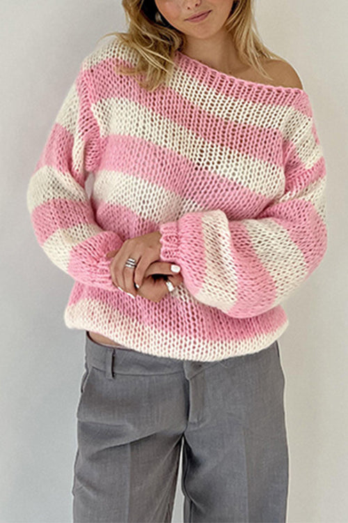 Dam pullover tröja i randigt, drop shoulder, stylad för en avslappnad look, perfekt vår- och höstmode.