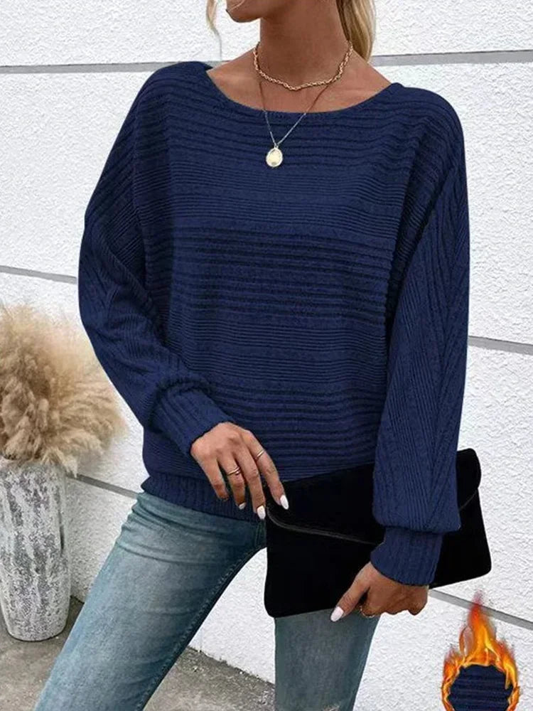 Damtröja randig, avslappnad passform. Höstmode: Bekväm och stilren tröja för en modern look.