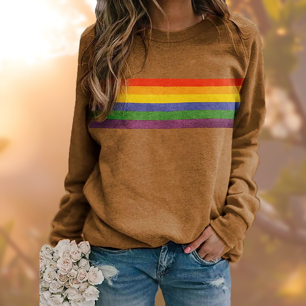 Färgstark dam pullover med regnbågsränder, långärmad i vintage-stil. Mjuk och bekväm för kalla dagar.