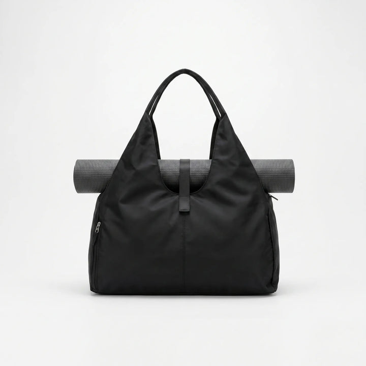 Elegant dam axelväska, perfekt som gymväska eller weekendbag. Slitstark sportväska för dina träningspass.