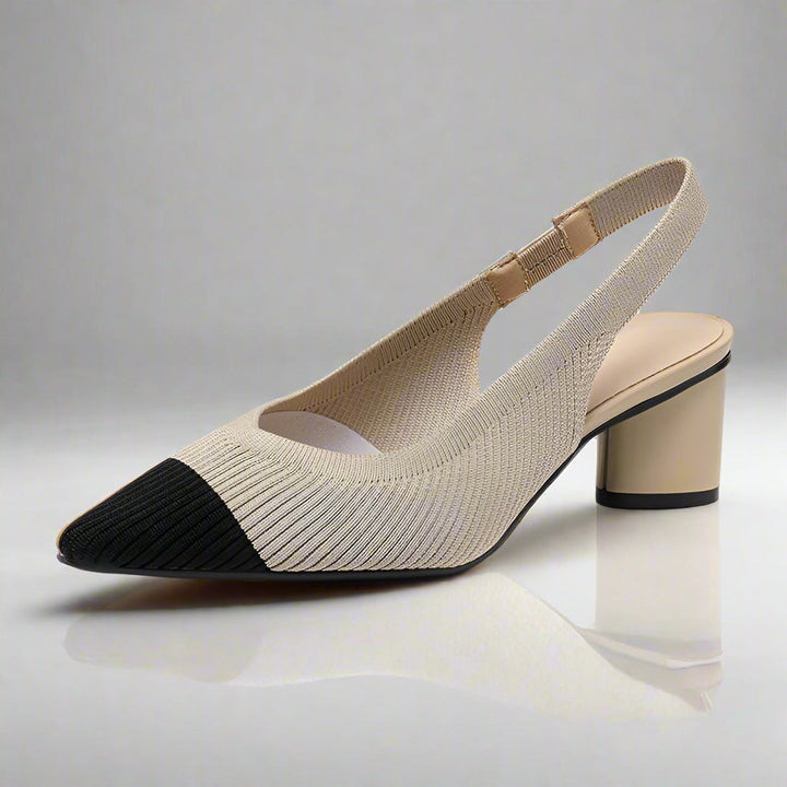 Stickade slingback damskor med spetsig tå. Låg blockklack ger stabilitet. Elegant & modern.