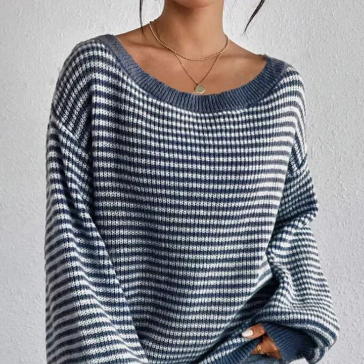 Bekväm damtröja, stickad med oversized passform och eleganta lanternärmar. Perfekt vintertröja.