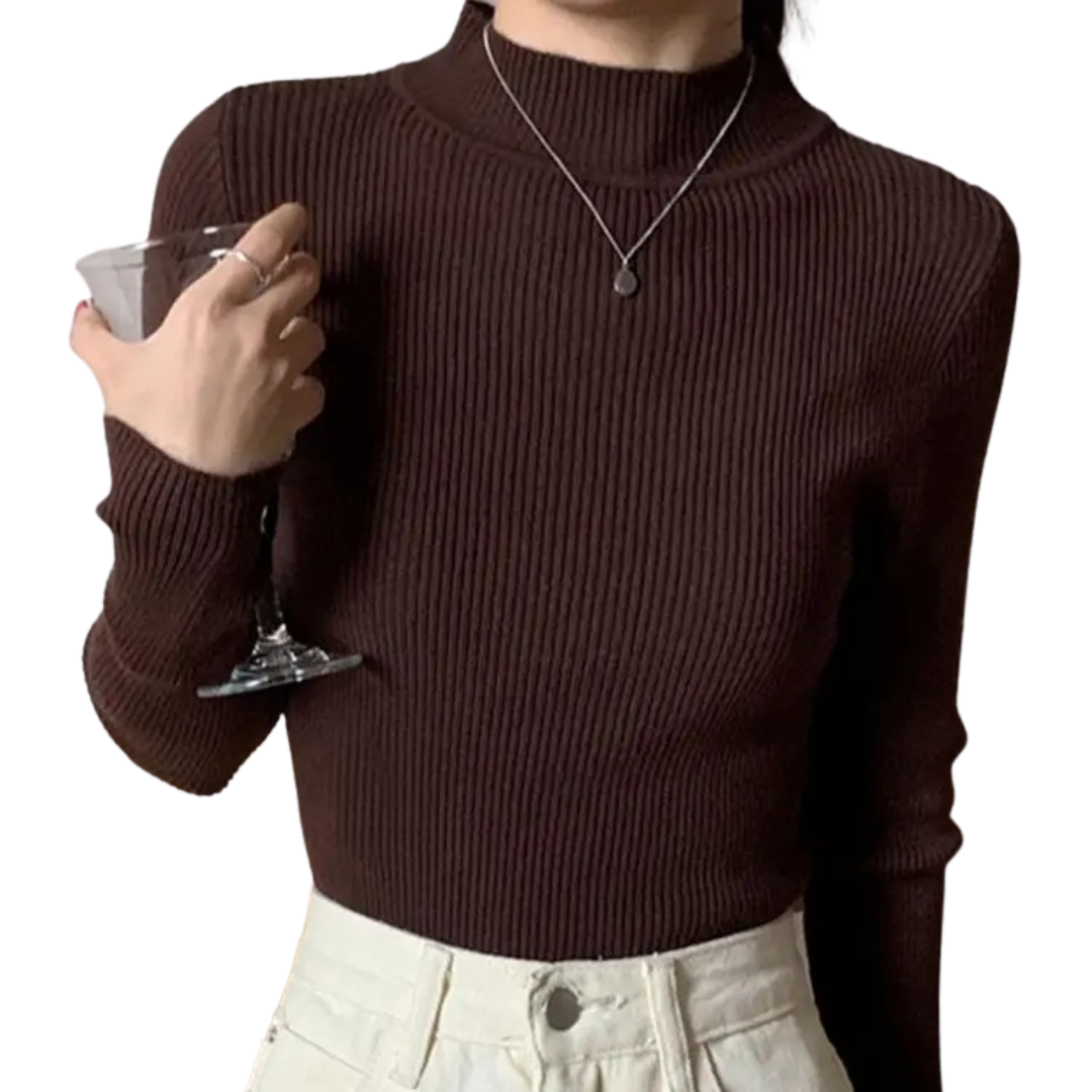Dam stickad pullover med elegant mockahals, perfekt för en tidlös och bekväm vardagsstil.