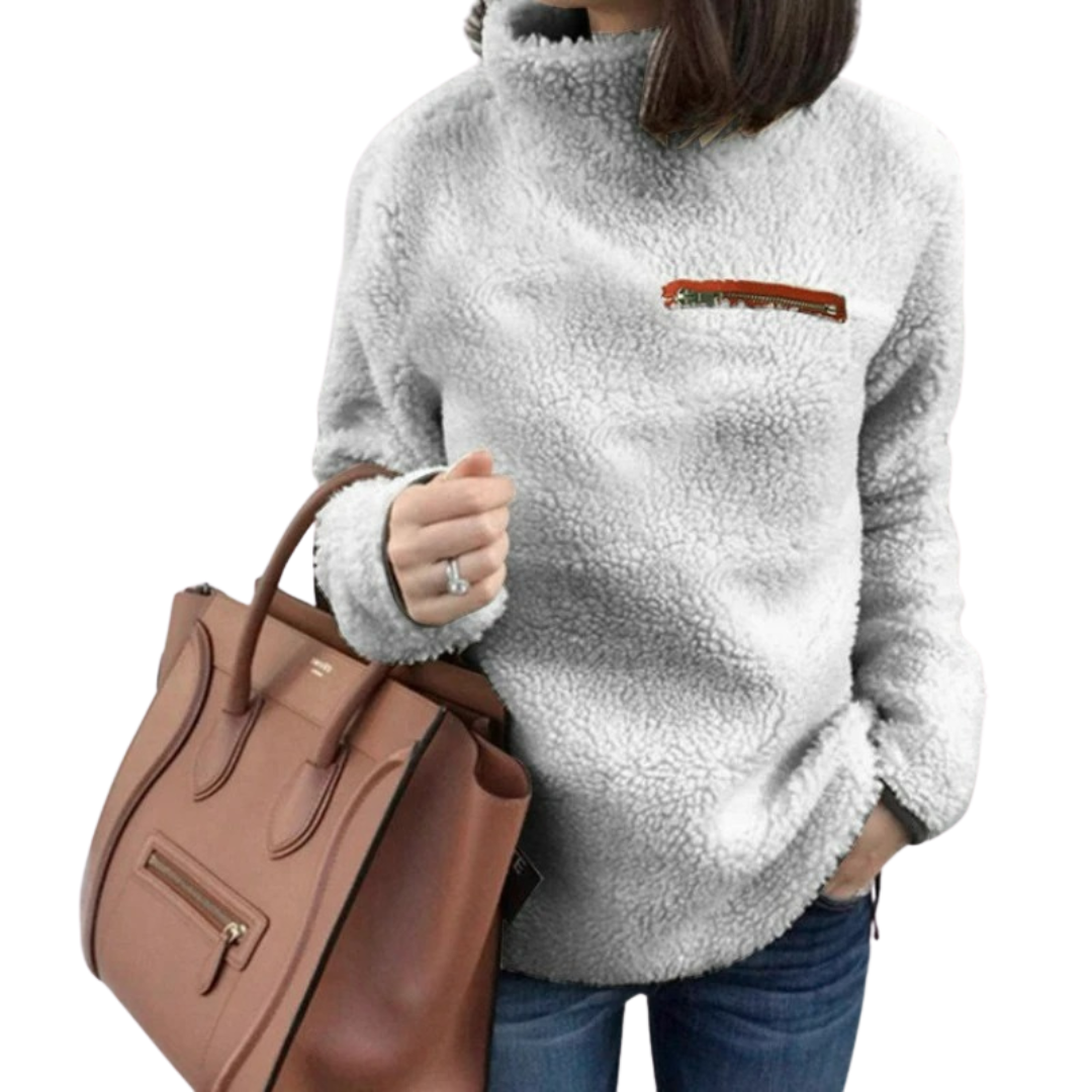 Mysig, sköldpaddshalsad damtröja. Enfärgad pullover i mjukt material, idealisk för kalla dagar.