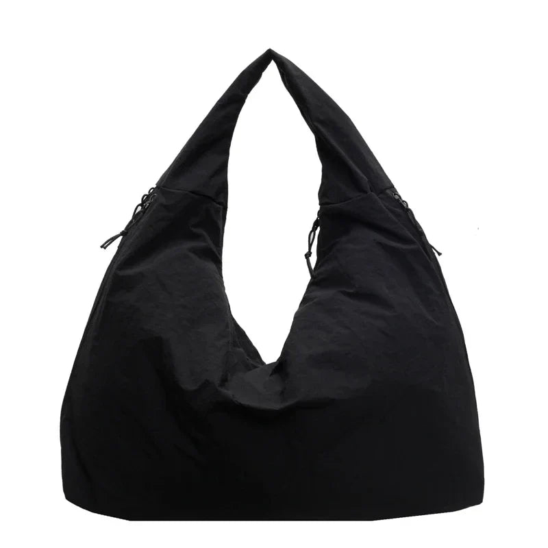 Dam Tote Bag – Minimalistisk & flexibel tygväska för vardagen, arbete och shopping.