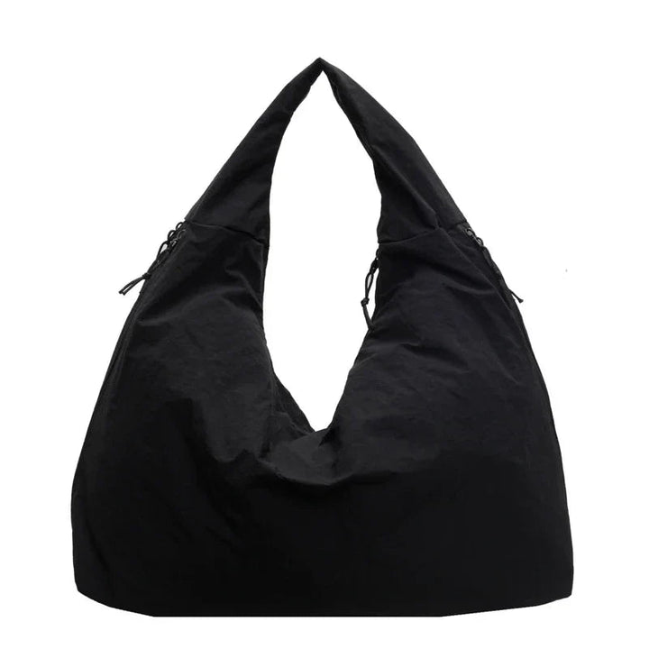 Dam Tote Bag – Minimalistisk & flexibel tygväska för vardagen, arbete och shopping.