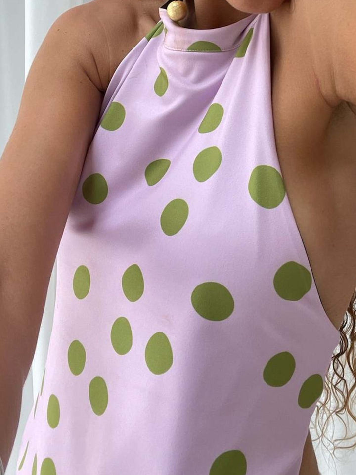 Bekväm och kvinnlig rygglös tank top, tryckt mönster, sommarplagg.