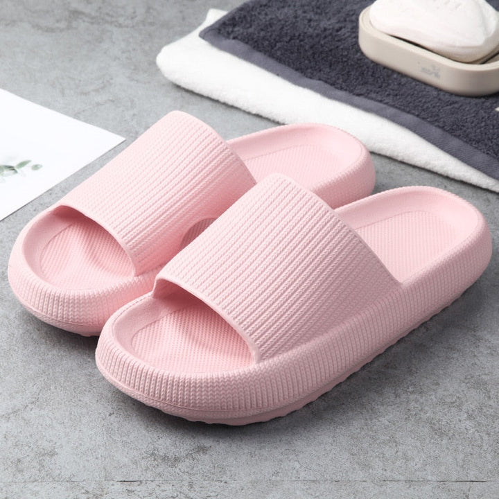 Halkfria unisex-toflor med plattform i elegant grått för ultimat komfort.