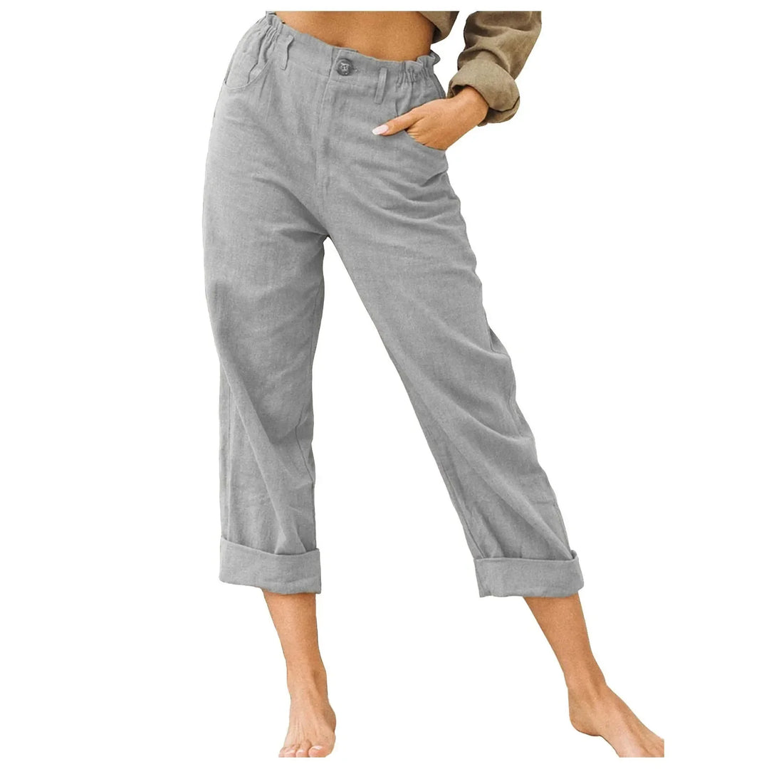 Breda byxor för kvinnor med fickor, hög midja och vida, bekväma ben idealiska för yoga.
