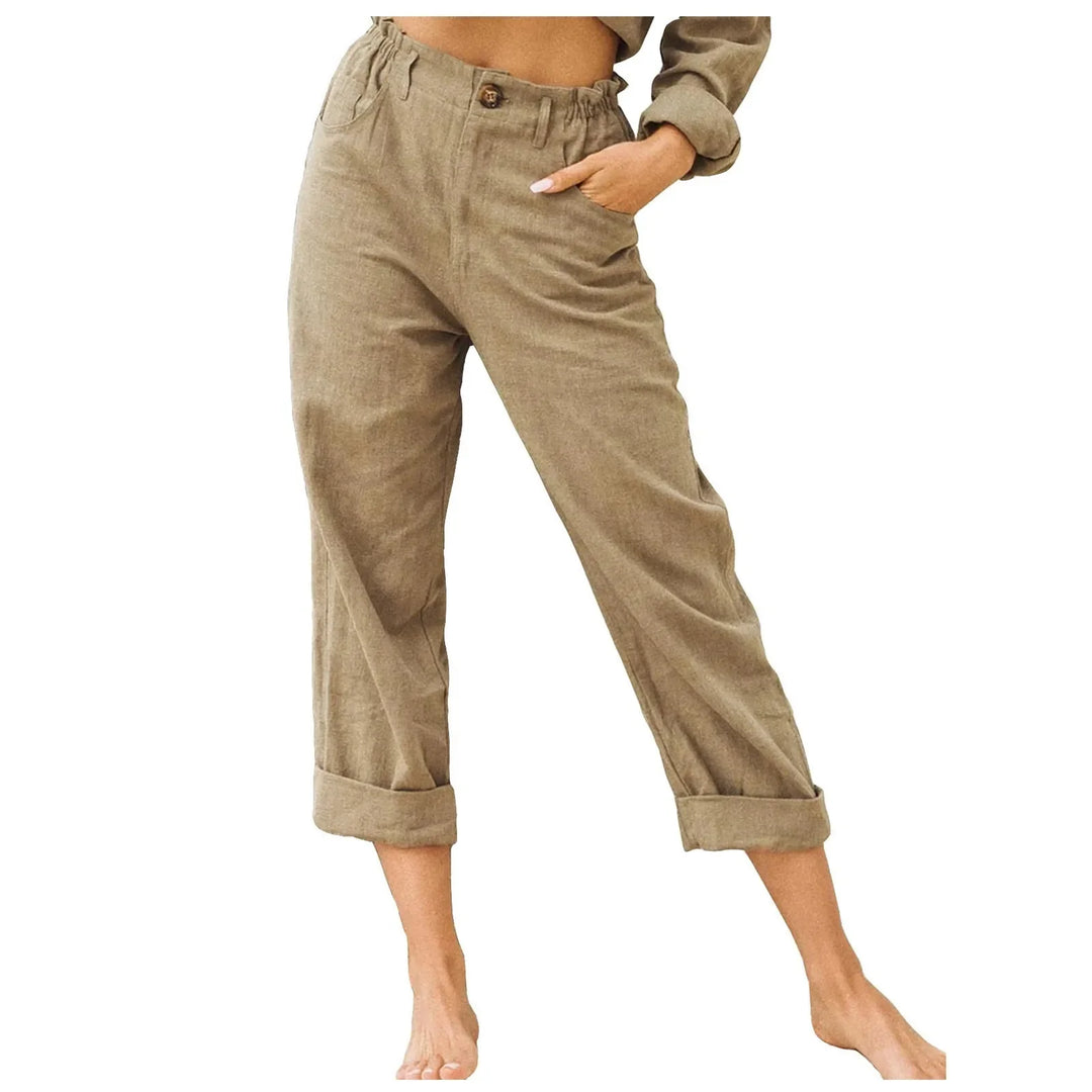 Avslappnade dambyxor med vida ben och hög midja, visar elegant passform, bra för alla tillfällen.