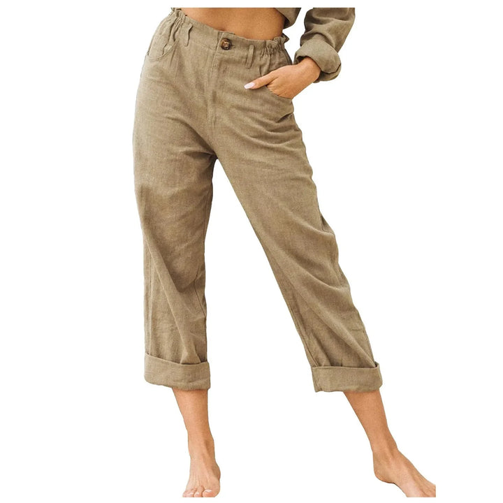 Avslappnade dambyxor med vida ben och hög midja, visar elegant passform, bra för alla tillfällen.