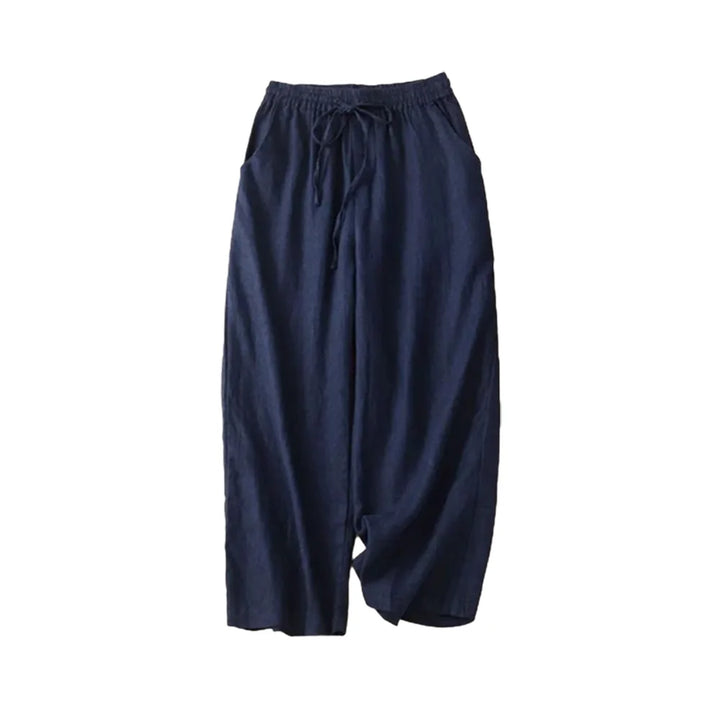 Dambyxor med hög midja och vida ben, perfekta för casual sommaroutfit.