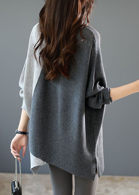 Unik grå damtröja med asymmetriskt patchwork. Vintermode, lager på lager & bekväm stil.