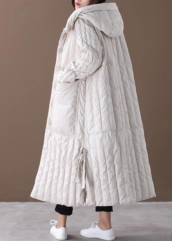 Vinterkappa dam plus size med mysig huva och stora fickor, idealisk för att möta vintern med stil.