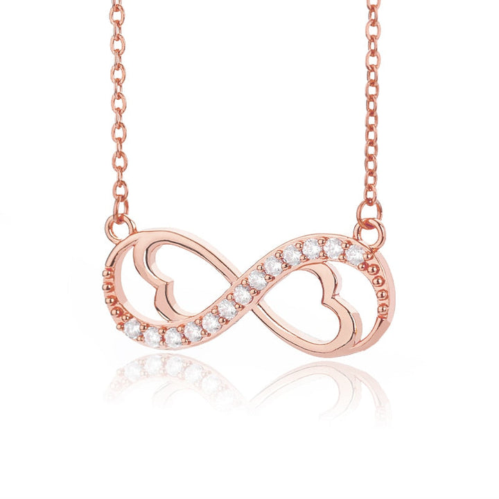 Damhalsband med oändlighetssymbol i silver, elegant smycke för evig kärlek.