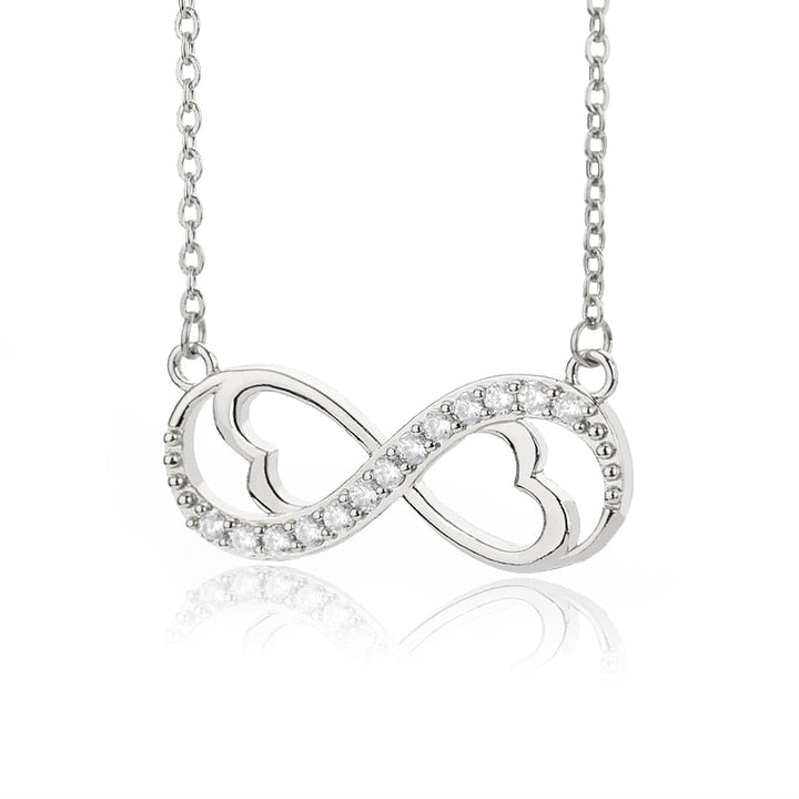 Elegant oändlighetshalsband symboliserar evig kärlek, en meningsfull present för henne.