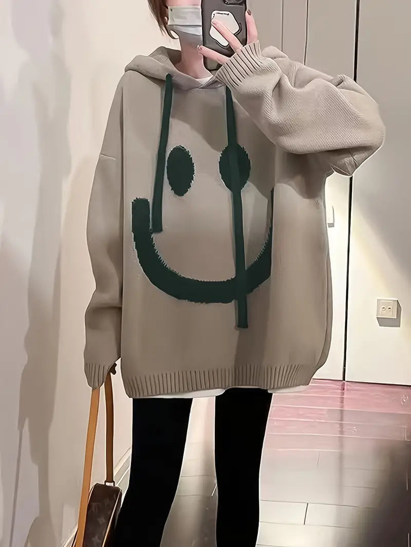 Damhuvtröja med leende design, mjuk och bekväm för casual vardagsstil.