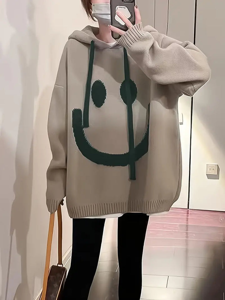 Damhuvtröja med leende design, mjuk och bekväm för casual vardagsstil.