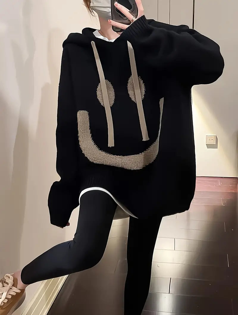 Mjuk damhoodie med söt leendedesign. Mysig och stilfull för en glad känsla varje dag.
