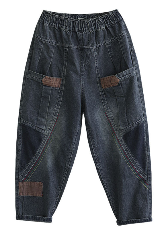 Damjeans med patchwork i blue denim, hög midja och avslappnad passform, perfekt för höstmode.