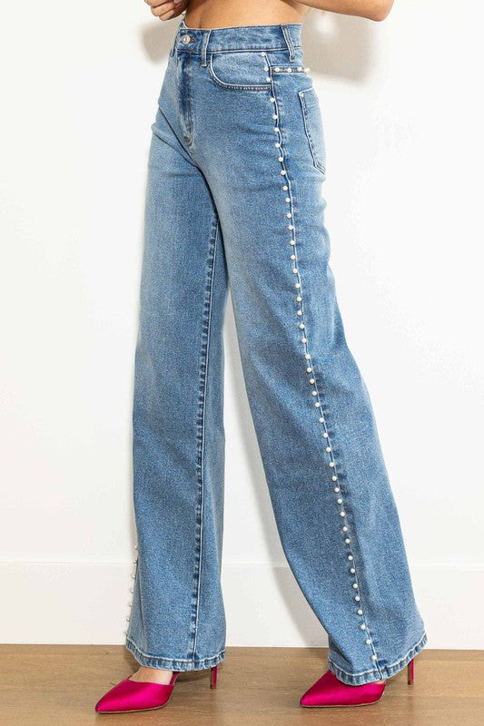 Moderna damjeans i medium stone med avslappnad passform, hög midja och vida ben i denim.