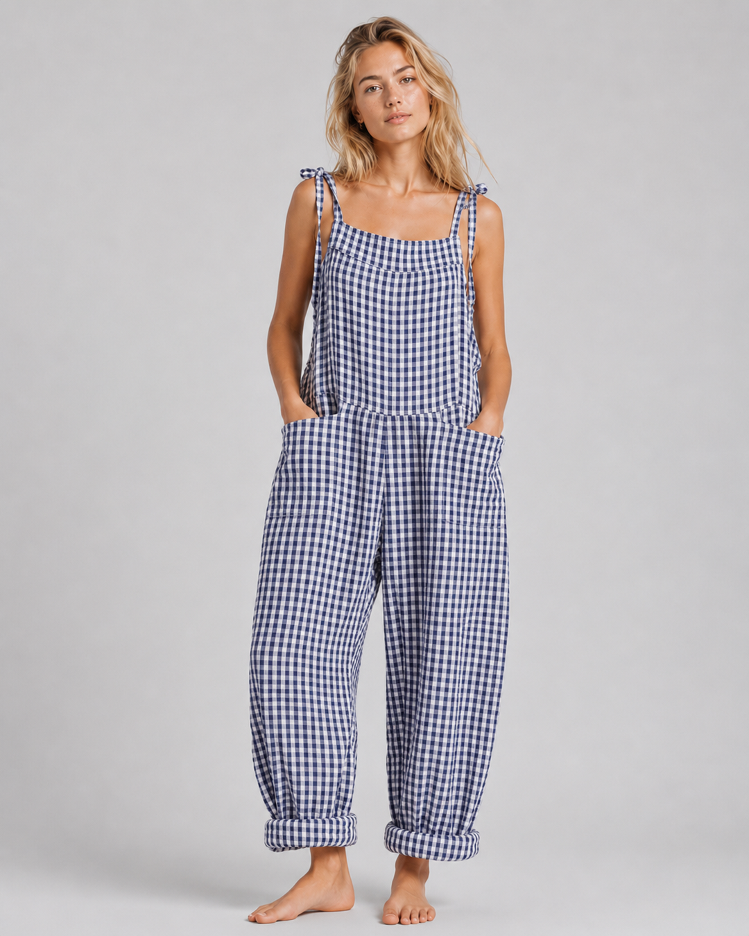 Somrig damjumpsuit med lös passform. Lätt & luftig byxdress för bekväm elegant stil.
