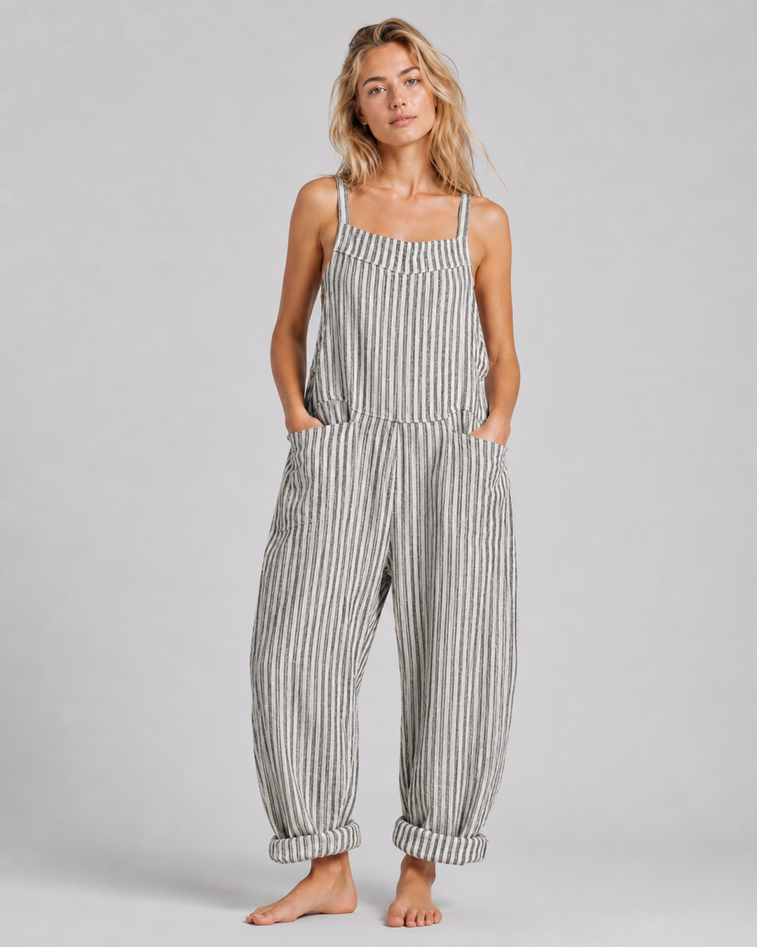 Festkläder: Elegant damjumpsuit med lös passform. Chic byxdress för speciella tillfällen.