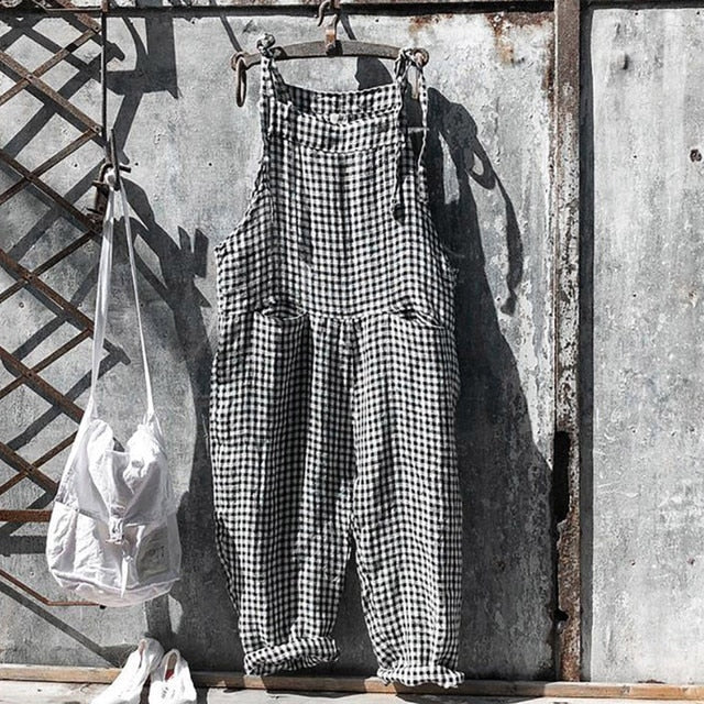 Sidovy: Elegant lös byxdress för dam. Ger en bekväm silhuett för alla tillfällen.