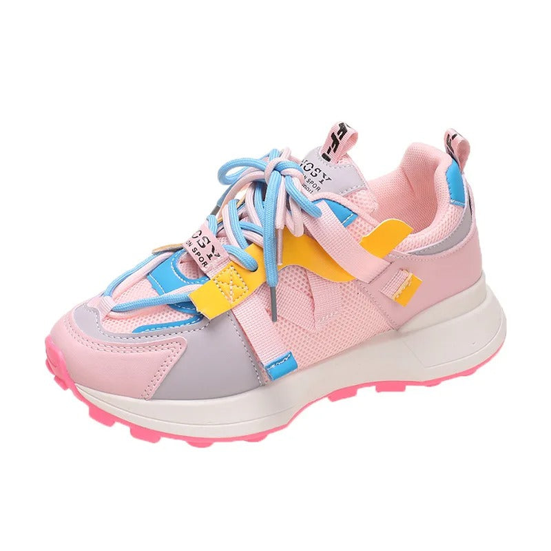 Dammode sneakers med färgblock och plattformssula för en trendig vardagslook.