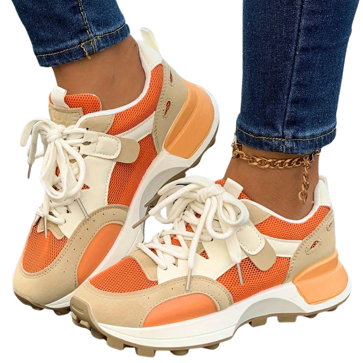 Bekväma damsneakers med färgblock och hög plattformssula, perfekta för vardagen.