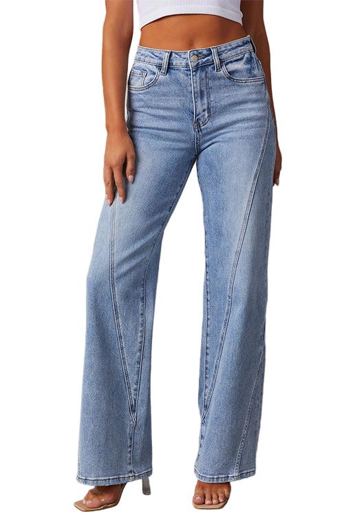 Dams raka jeans med slitna detaljer i denim, perfekt för vardagsmode.