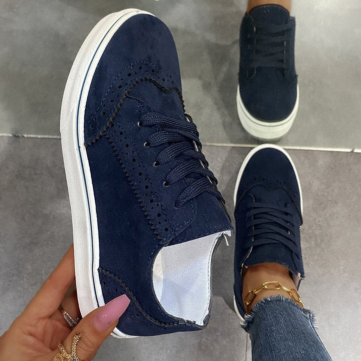 Bekväma blå damsneakers med elastiska snören, lätta att ta på och av, sportiga