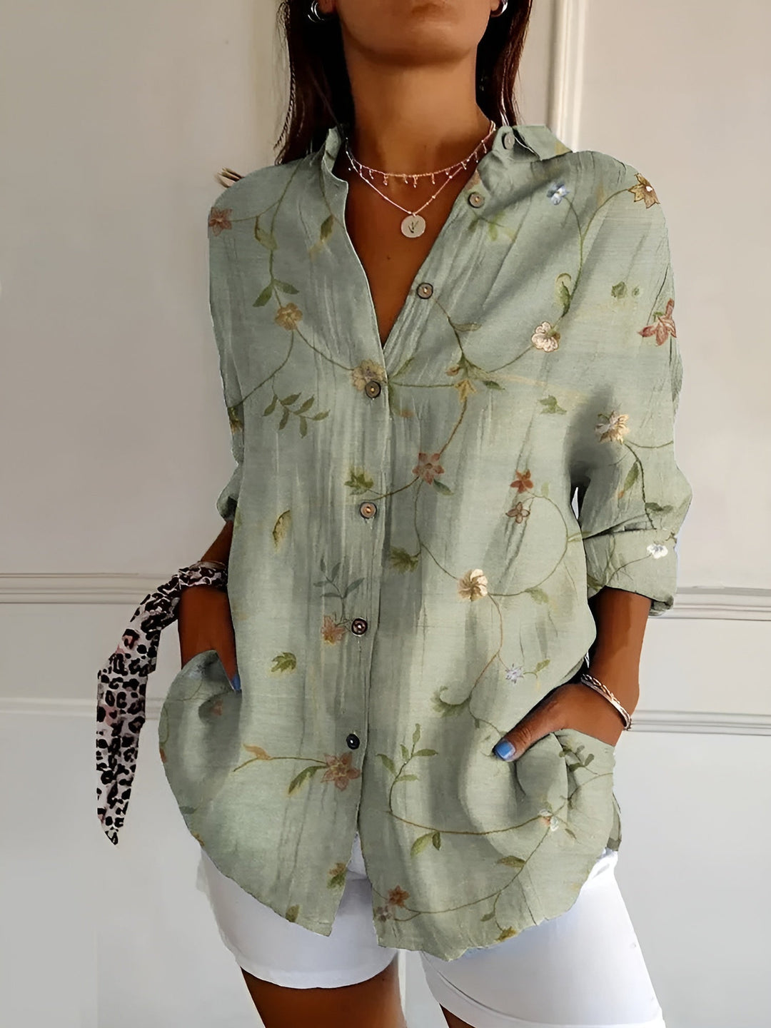 Chic långärmad blus för dam med blommönster och flödande passform
