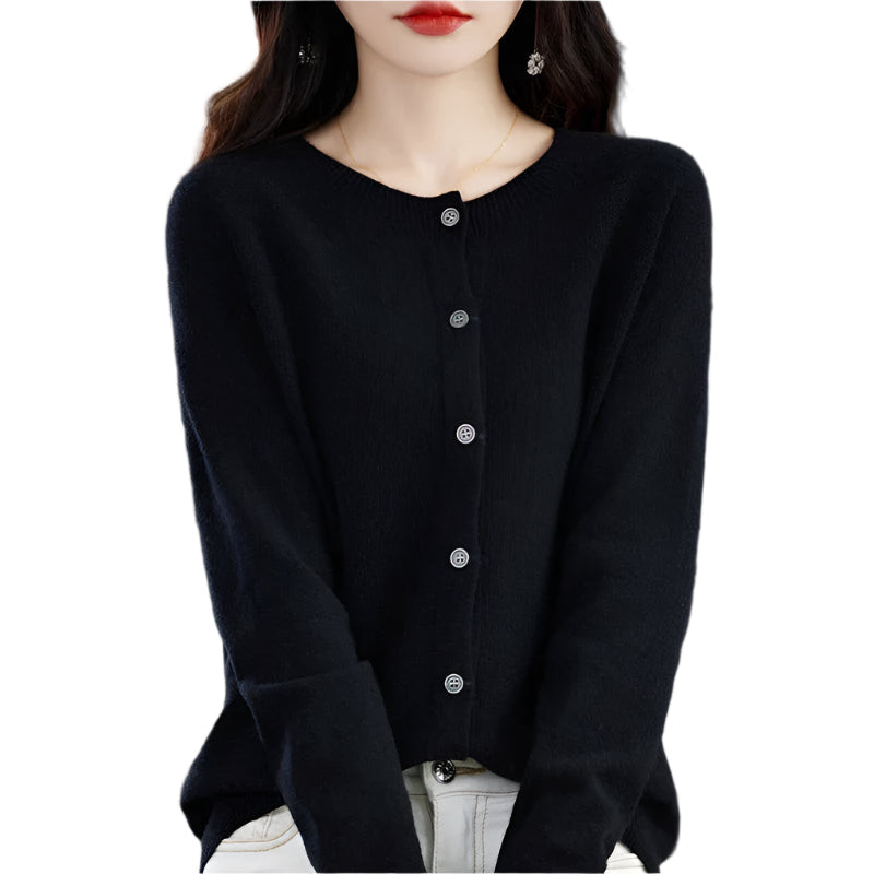Damväst med rund hals i stilren design för en elegant vardagslook. Värmande och bekväm.