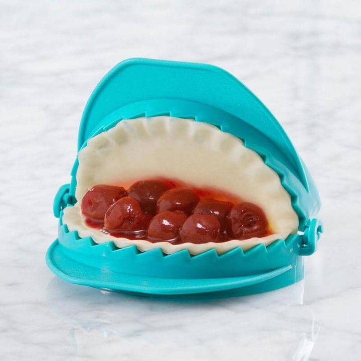 Detaljbild av degpress small, perfekt för små dumplings och aptitretare, effektivt baktillbehör.