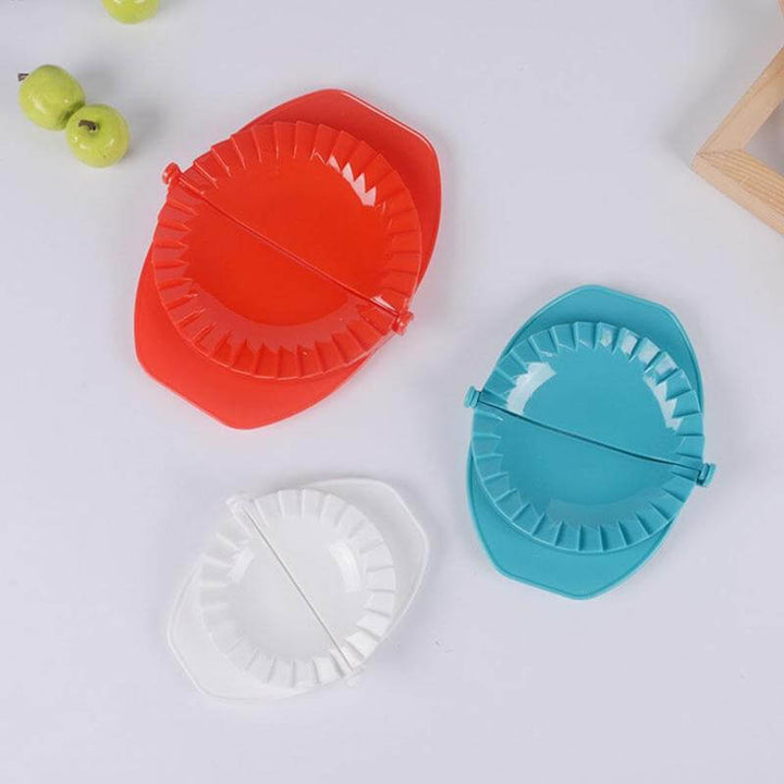 Närbild på handtagen av degpressarna, ergonomisk design för ett bekvämt grepp vid bakning.