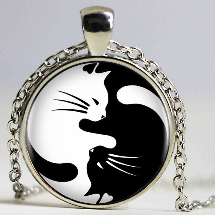 Elegant kattsmycke: halsband med yin yang-symbol. En meningsfull accessoar för alla kattälskare.