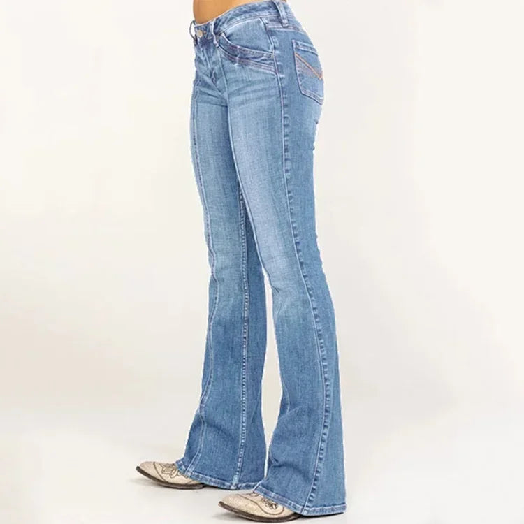 Utsvängda benslut på retro damjeans, klassisk denim, moderiktiga