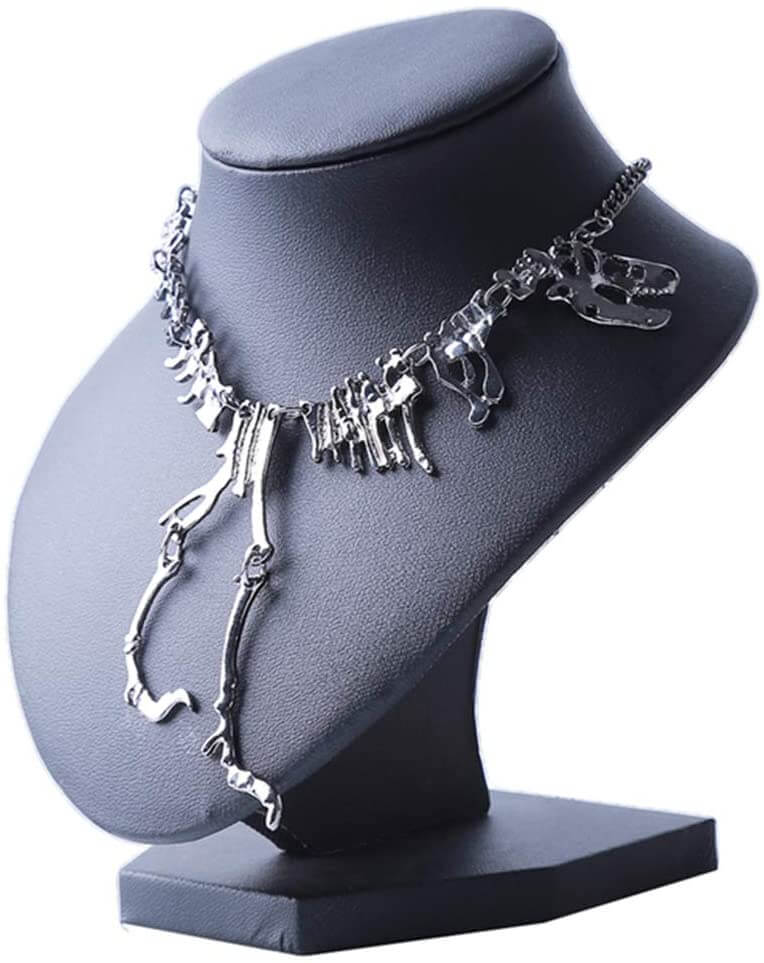 Trendigt T-Rex skelett halsband. Unisex statement-smycke i zinklegering. Dinosauriepresent.