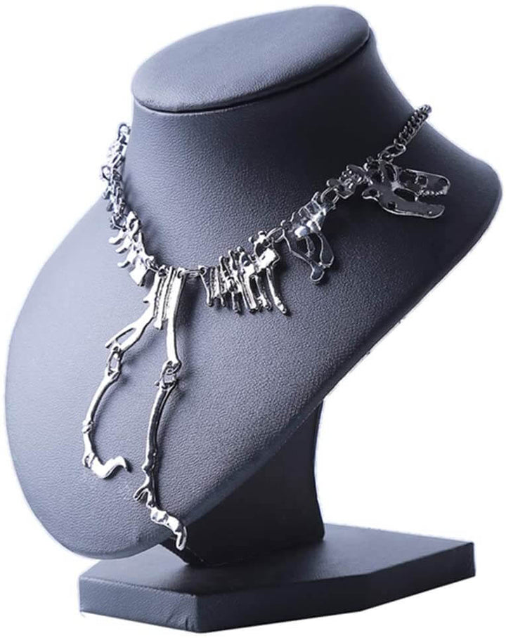Trendigt T-Rex skelett halsband. Unisex statement-smycke i zinklegering. Dinosauriepresent.