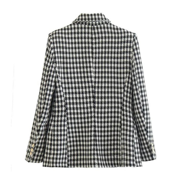 Elegant dubbelknäppt houndstooth blazer för kvinnor, perfekt för mode och vintage-inspirerade outfits.