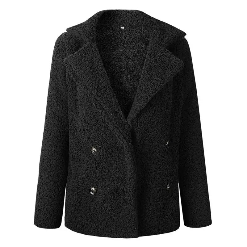 Oversized dubbelknäppt nallejacka, damkappa i stilren design, idealisk för höst- och vintermode.