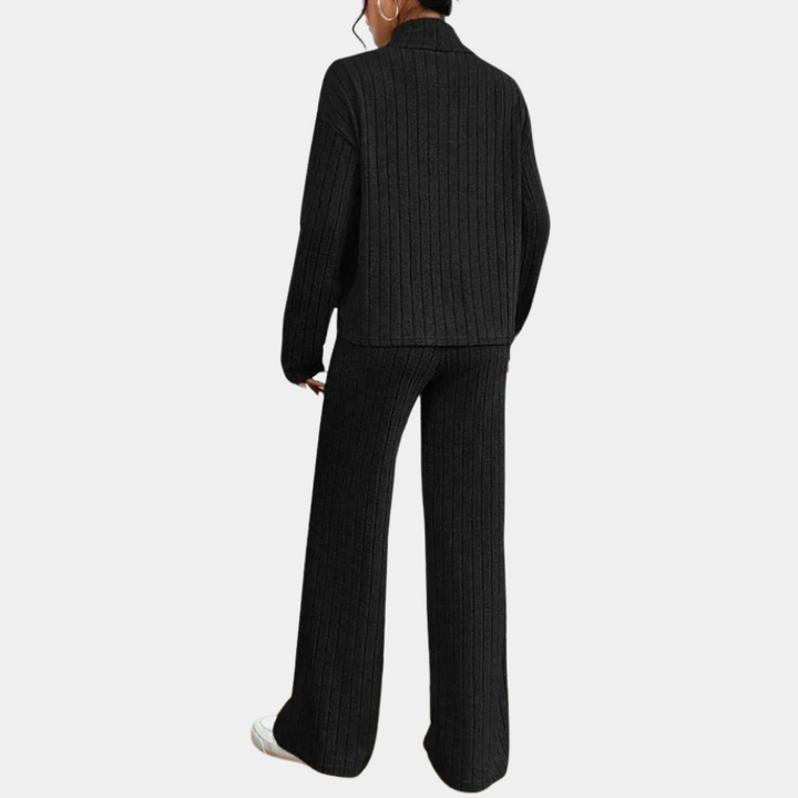 Vardagslook eller kontorskläder? Detta 2-delade set för kvinnor med ståkrage och knappar passar utmärkt.