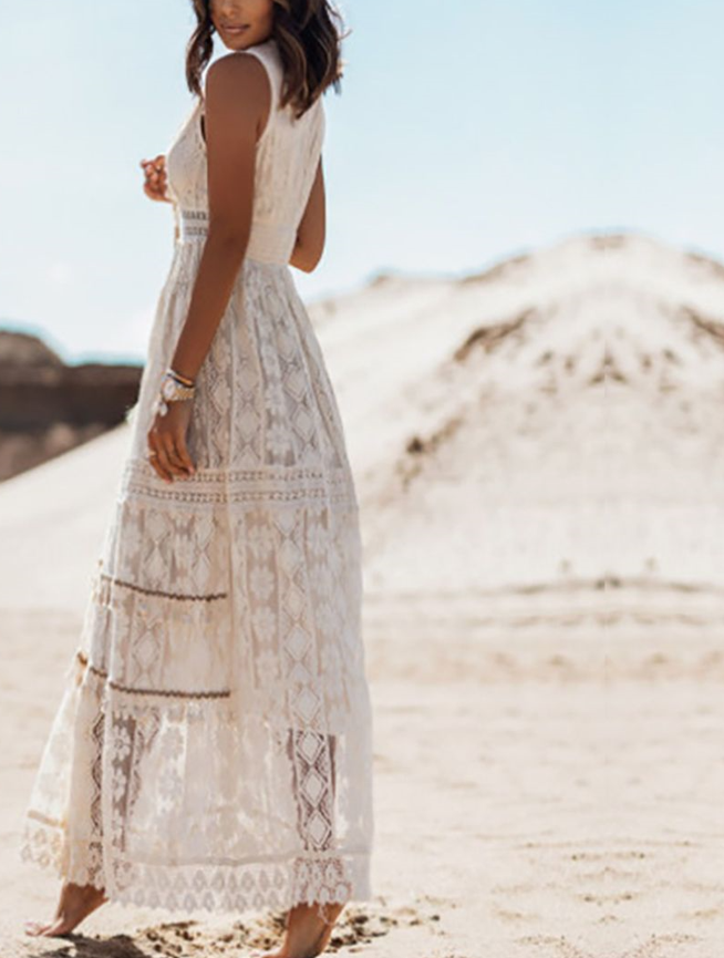 Boho-inspirerad dam maxiklänning, en elegant festklänning eller avslappnad semesterklänning i sommarstil.