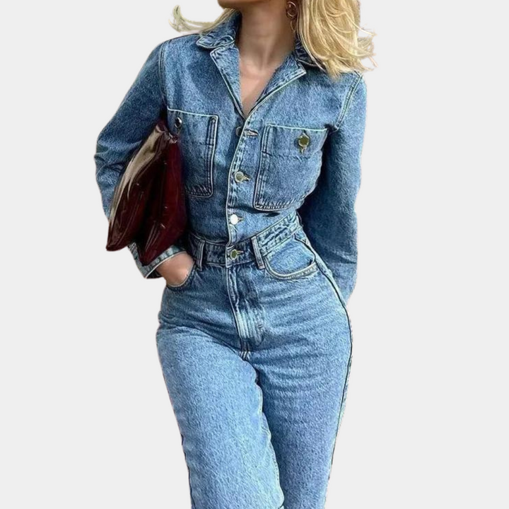 Blå långärmad dam jumpsuit, perfekt för chic vardagsstil eller fest. Tidlös design med bekväm passform och raka ben.