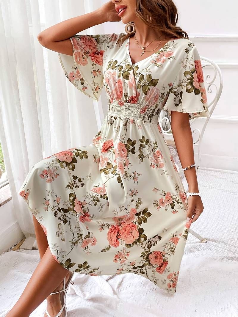 Damklänning för vardag eller fest: blommig A-linjeklänning med elegant v-ringning, bekväm polyester.