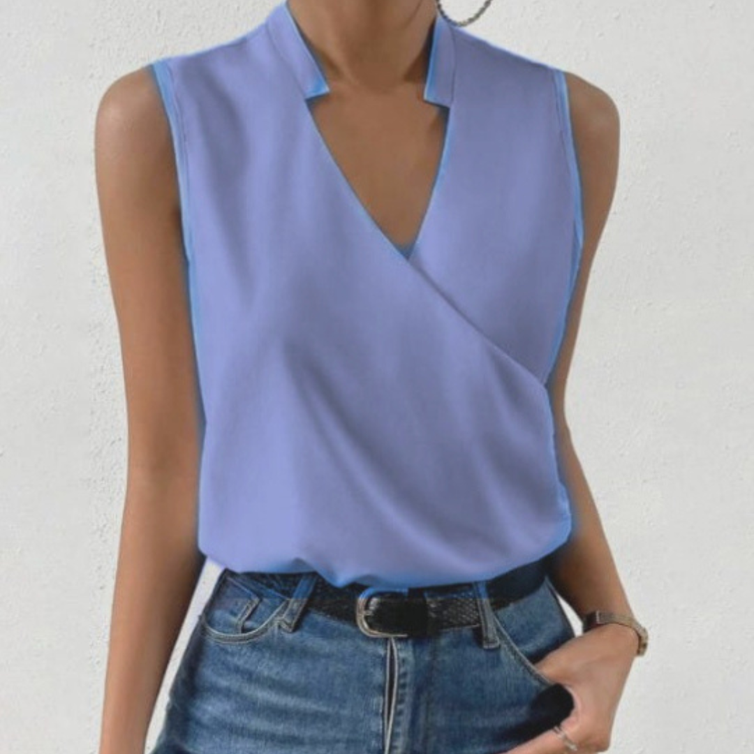 Blommig damtopp i luftig design, bekväm och stilren, perfekt sommarblus.