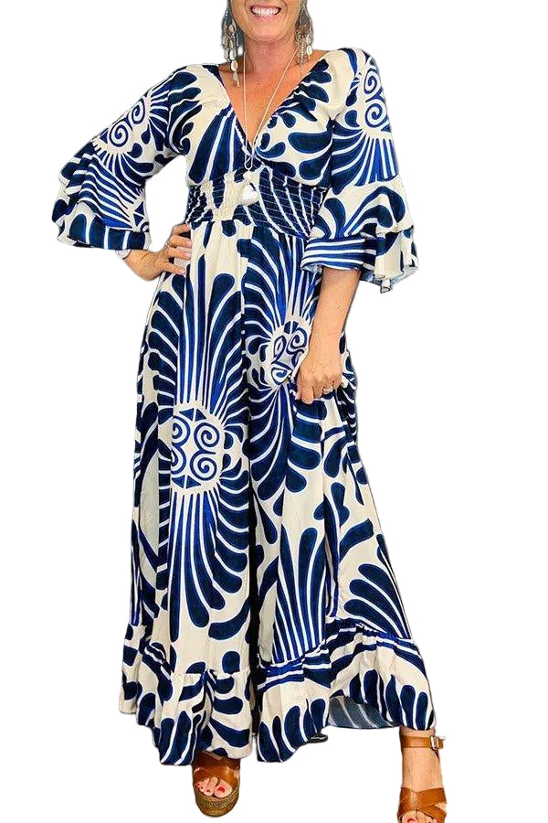 Elegant blommig jumpsuit för kvinnor med volanger, perfekt för fest och sommarmode. Bekväm kvinnors byxdress.