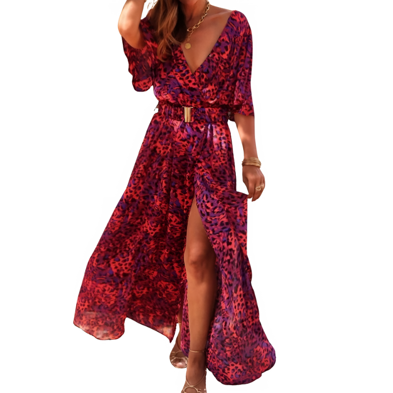 Dam maxiklänning, perfekt för sommaren. Blommig boho-stil med V-hals och smickrande split.